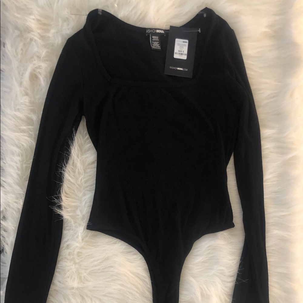 Brand new, black body suit!